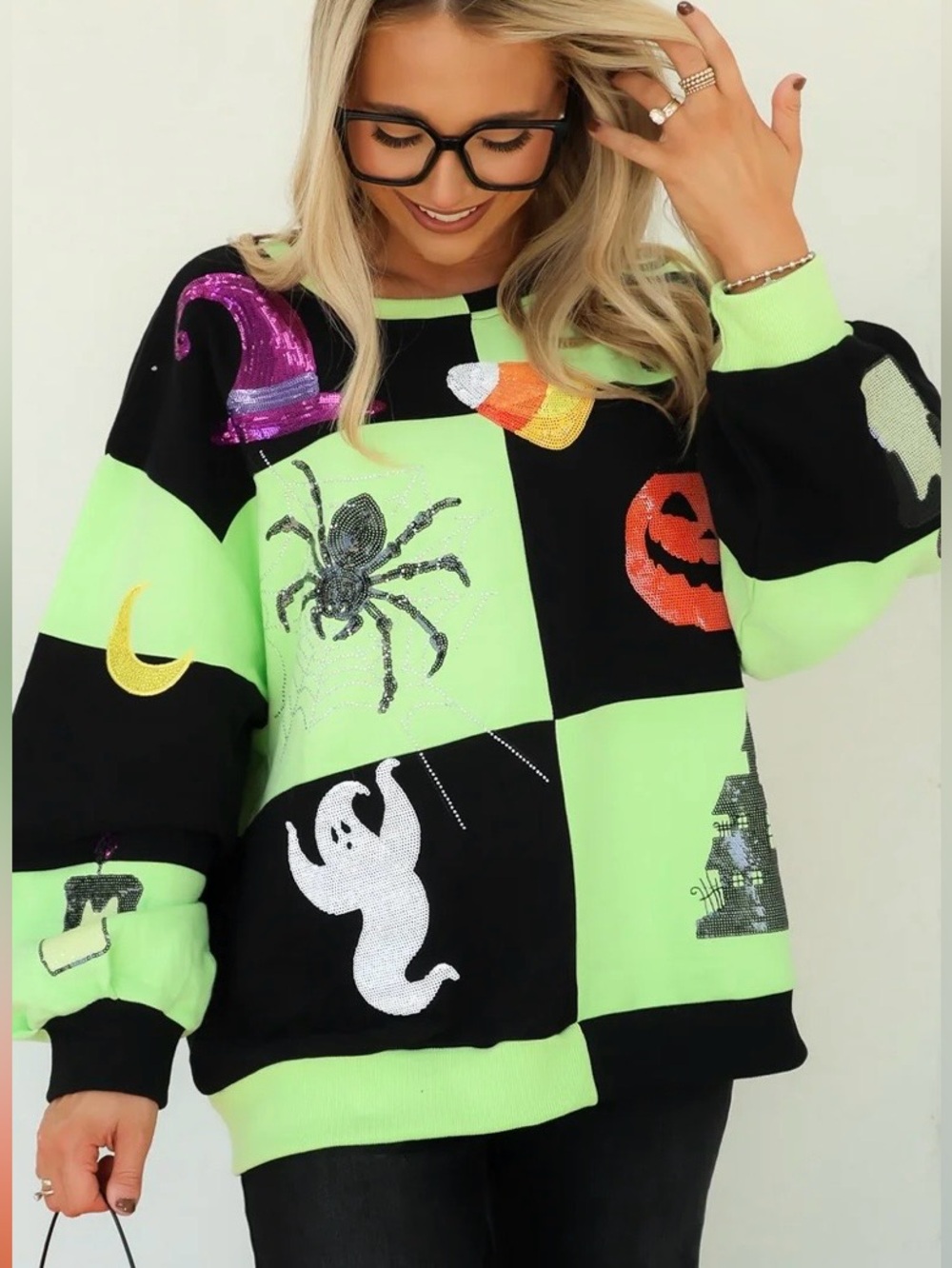 Queen of Sparkles Halloween
Light Green and Black checkered sweatshirt